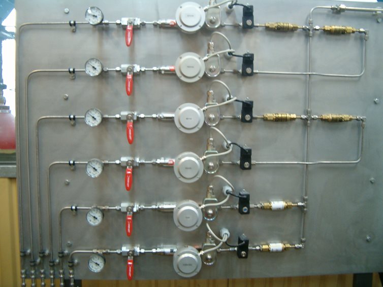 Mass flow controllers on a plate
